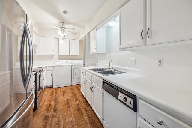 351 N Post Oak Ln Unit 617, Houston, TX 77024 - kitchen with white cabinets, stainless steel appliances, washer and clothes dryer, a sink, and ceiling fan