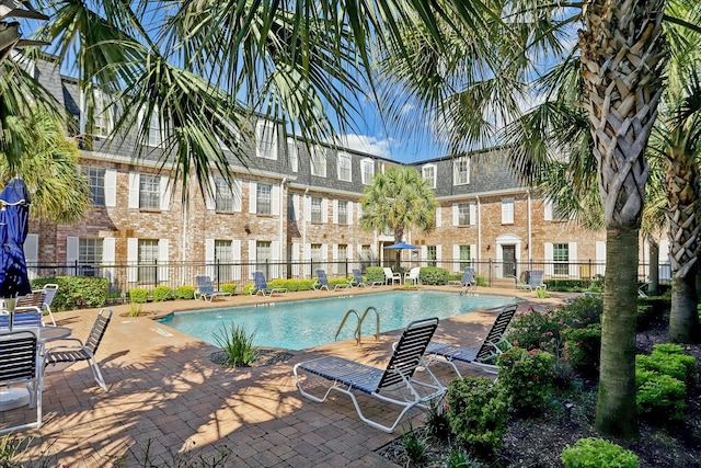 351 N Post Oak Ln Unit 617, Houston, TX 77024 - pool with fence and a patio area