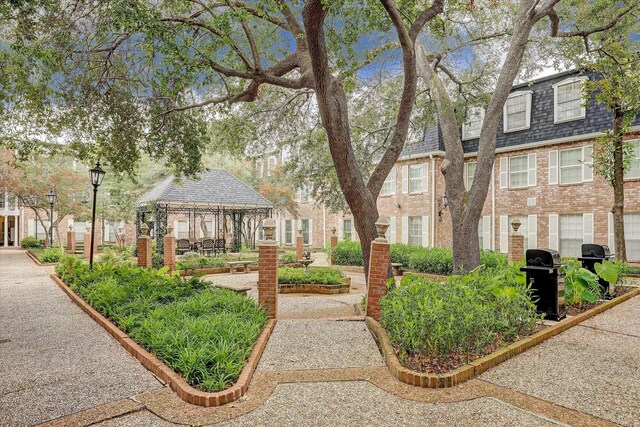 351 N Post Oak Ln Unit 617, Houston, TX 77024 - surrounding community featuring a gazebo and a residential view