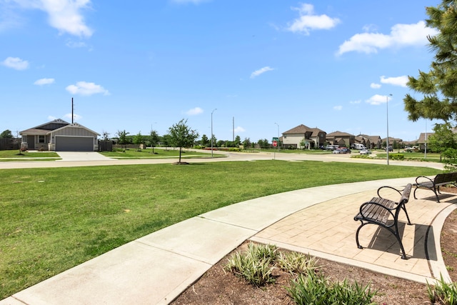 surrounding community featuring a lawn