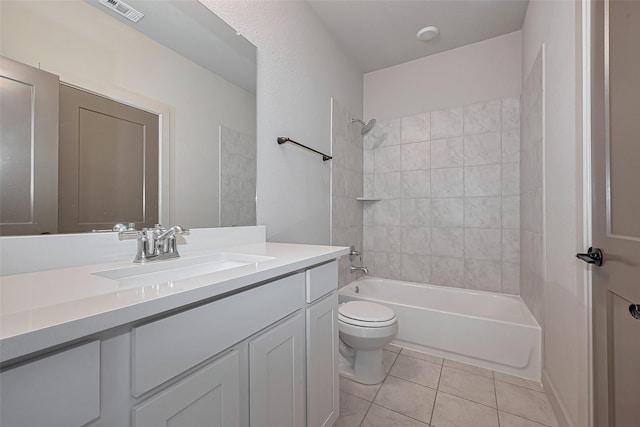 bathroom with tile patterned floors,  shower combination, toilet, visible vents, and vanity