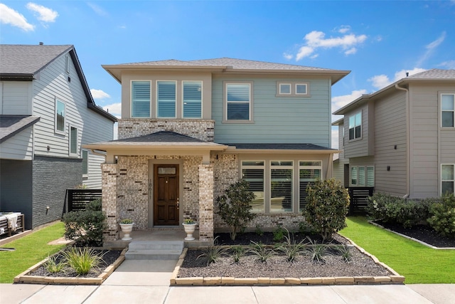 18611 Admiration Dr, Cypress, TX 77433 - view of front of property with a front lawn, brick siding, and roof with shingles