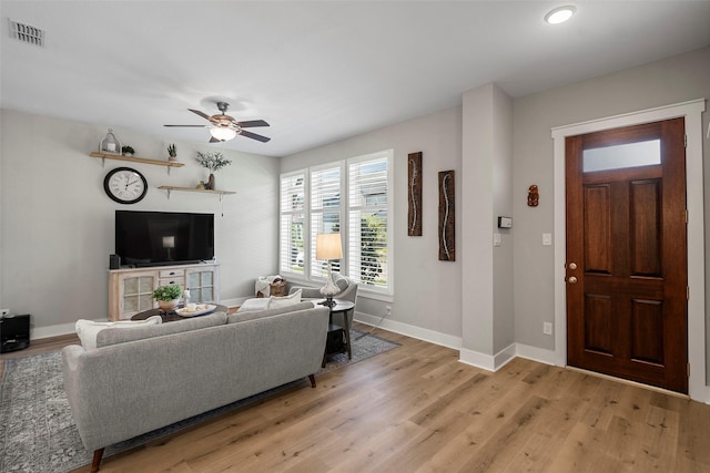 18611 Admiration Dr, Cypress, TX 77433 - living room with recessed lighting, visible vents, a ceiling fan, light wood-type flooring, and baseboards