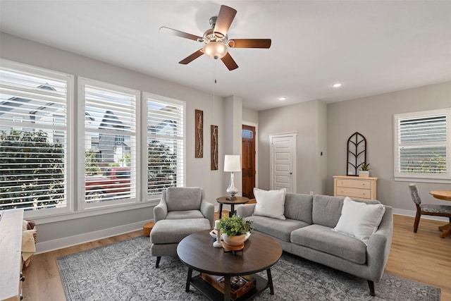 18611 Admiration Dr, Cypress, TX 77433 - living room with plenty of natural light, light wood-type flooring, baseboards, and ceiling fan