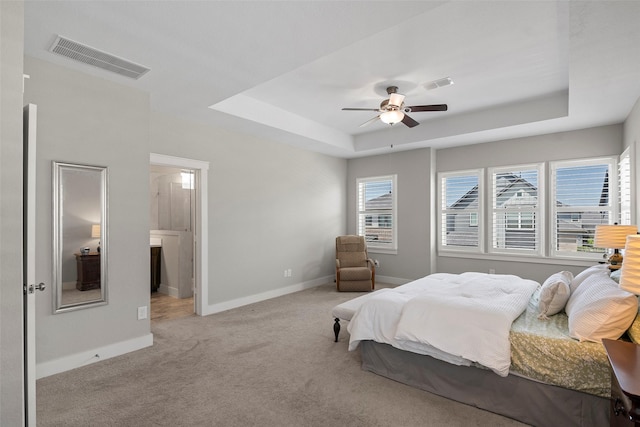 18611 Admiration Dr, Cypress, TX 77433 - bedroom with baseboards, carpet flooring, a tray ceiling, and visible vents