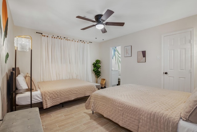 bedroom featuring a ceiling fan and wood finished floors