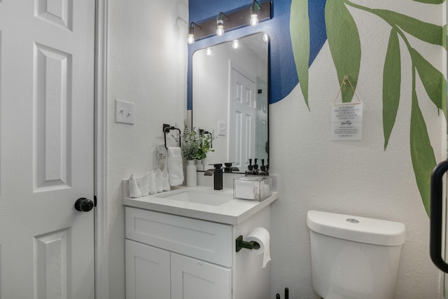 half bath with toilet and vanity