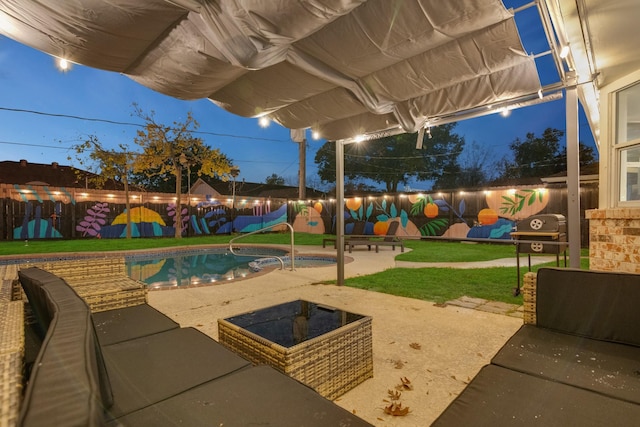 exterior space with a fenced backyard and a fenced in pool
