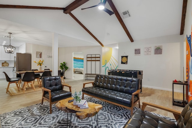 living room with high vaulted ceiling, ceiling fan with notable chandelier, light wood-style floors, beamed ceiling, and visible vents
