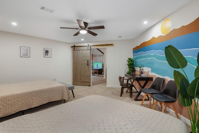 bedroom with a barn door, ceiling fan, visible vents, and recessed lighting