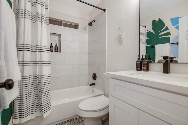 bathroom featuring toilet, vanity, and shower / bathtub combination with curtain