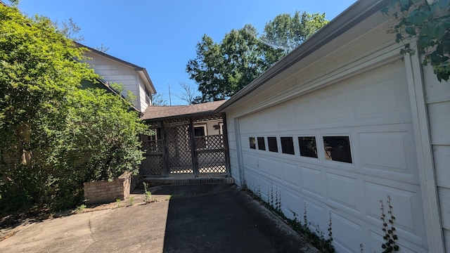 garage with driveway
