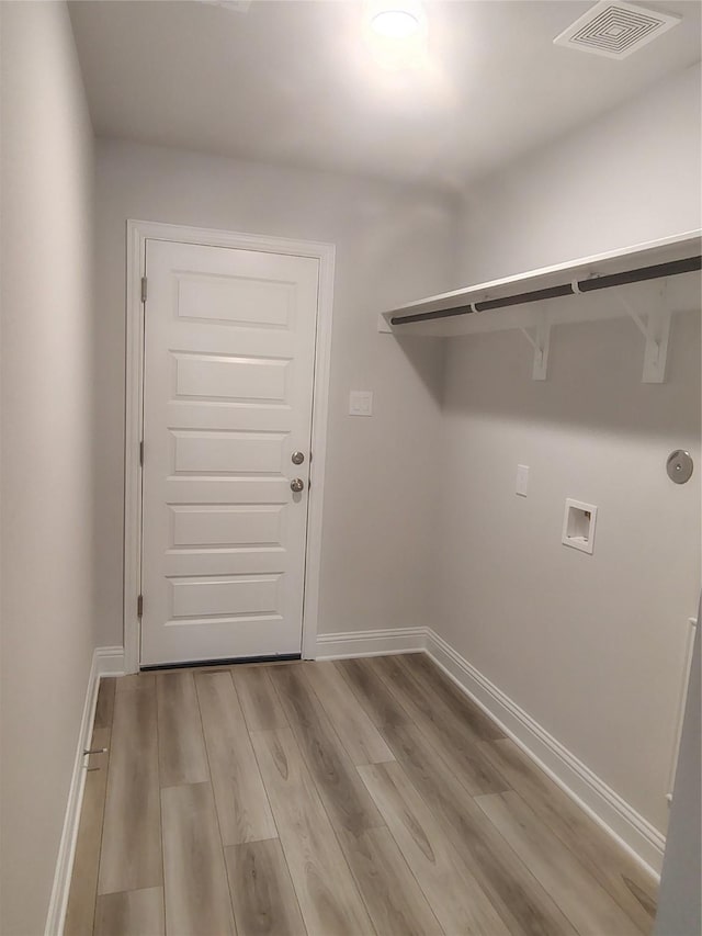 15 Gemstone Ct, Angleton, TX 77515 - clothes washing area with baseboards, visible vents, laundry area, and washer hookup
