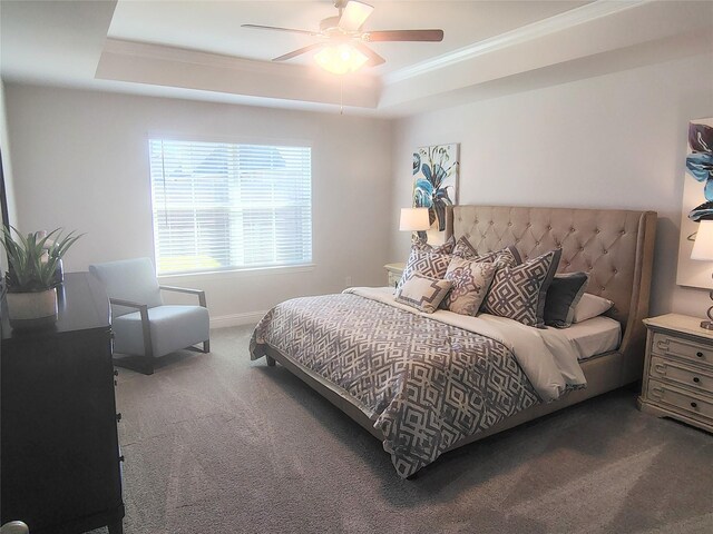 15 Gemstone Ct, Angleton, TX 77515 - carpeted bedroom featuring baseboards, ornamental molding, a ceiling fan, and a raised ceiling
