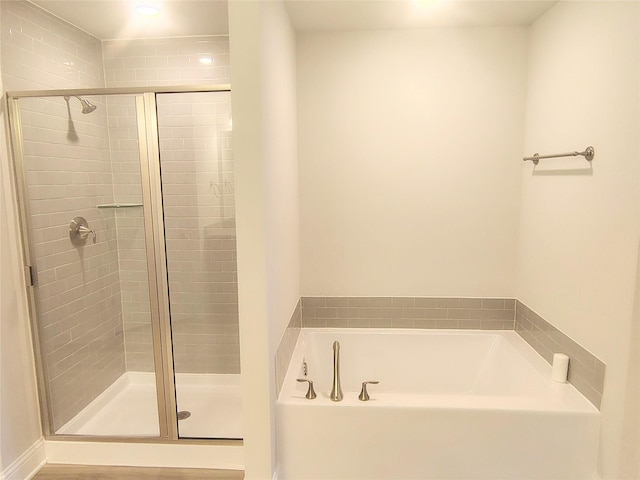 15 Gemstone Ct, Angleton, TX 77515 - full bathroom with a bath and a stall shower