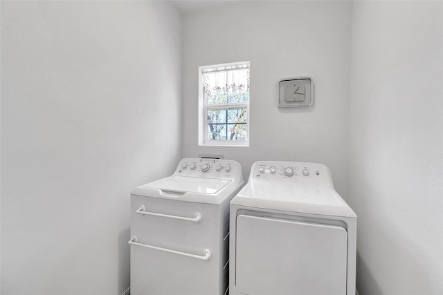 washroom with washer and dryer and laundry area