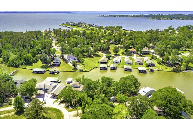 birds eye view of property with a residential view and a water view