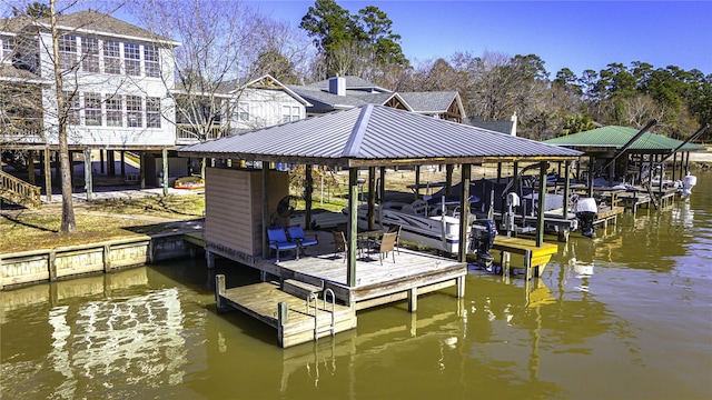 view of dock with a water view and boat lift