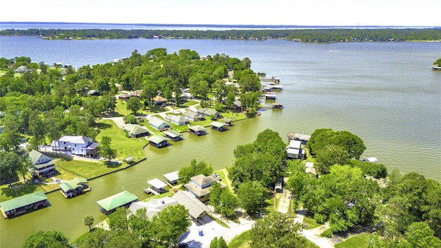 birds eye view of property with a residential view and a water view