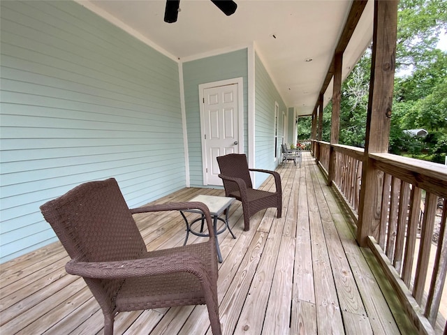 wooden terrace with ceiling fan