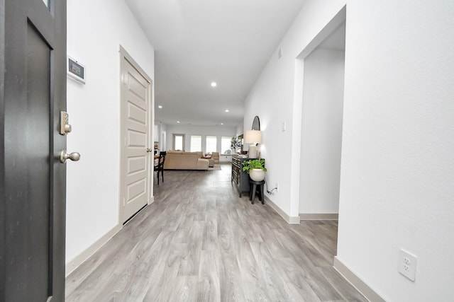 1731 Maclane Ct, Richmond, TX 77469 - hall with recessed lighting, light wood-type flooring, and baseboards