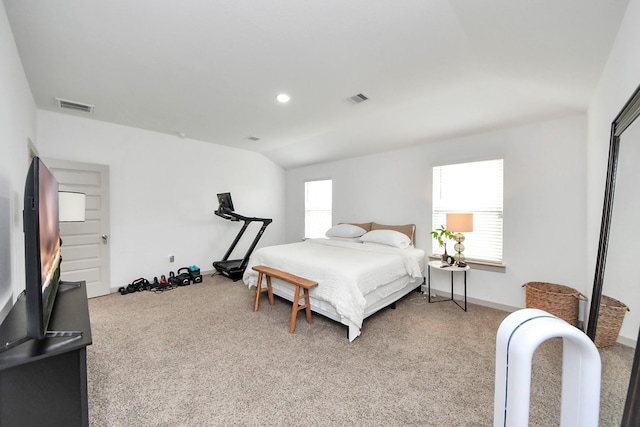 bedroom featuring visible vents, baseboards, carpet, and lofted ceiling