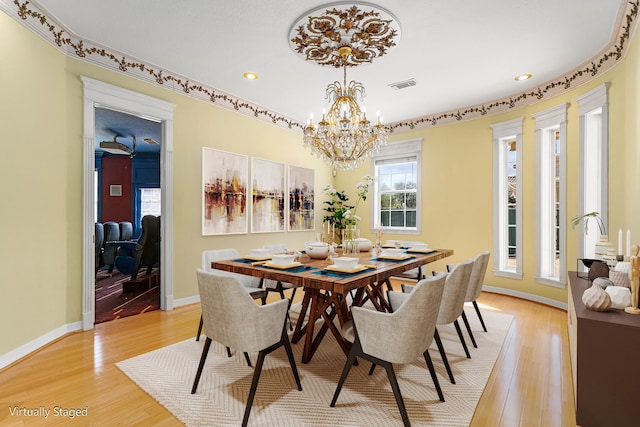 1002 Island Vw, League City, TX 77565 - dining area featuring a notable chandelier, light wood-style flooring, visible vents, and recessed lighting