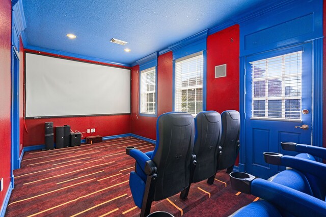 1002 Island Vw, League City, TX 77565 - home theater room featuring a textured ceiling and visible vents