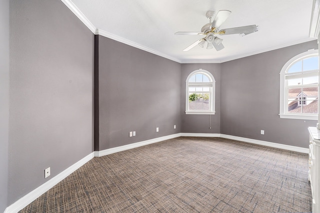 1002 Island Vw, League City, TX 77565 - spare room featuring baseboards, a ceiling fan, carpet flooring, and crown molding