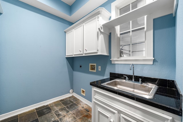 1002 Island Vw, League City, TX 77565 - washroom featuring a sink, baseboards, electric dryer hookup, cabinet space, and washer hookup