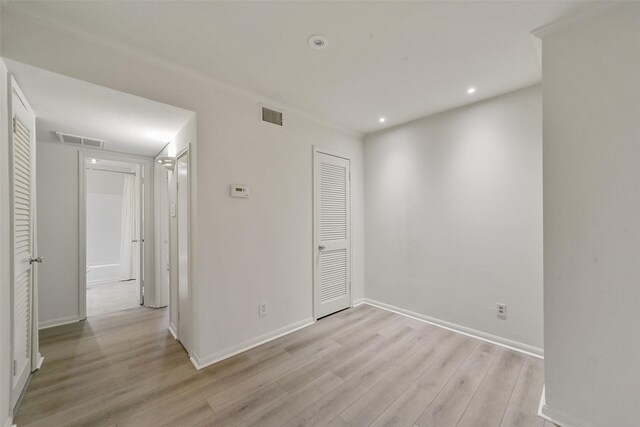 2507 Montrose Blvd Unit 50, Houston, TX 77006 - unfurnished room featuring baseboards, light wood-style floors, and visible vents
