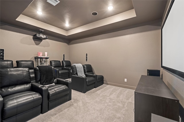carpeted cinema featuring recessed lighting, a raised ceiling, visible vents, and baseboards