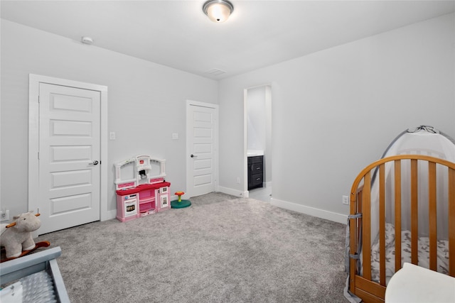 carpeted bedroom with baseboards