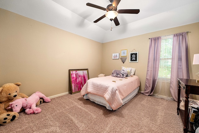 bedroom with baseboards, a ceiling fan, and light colored carpet