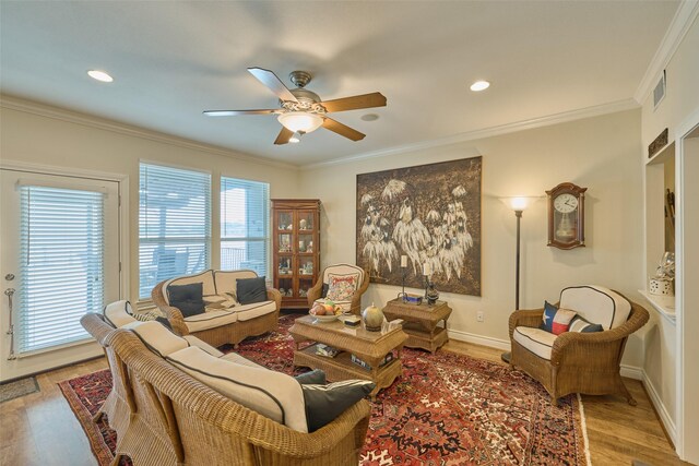 102 Capetown Slip, Conroe, TX 77356 - living room with ceiling fan, wood finished floors, crown molding, recessed lighting, and baseboards