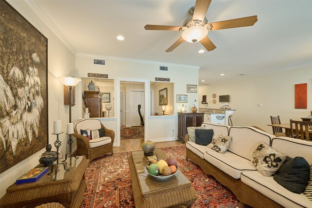 102 Capetown Slip, Conroe, TX 77356 - living area with wood finished floors, a ceiling fan, ornamental molding, and recessed lighting