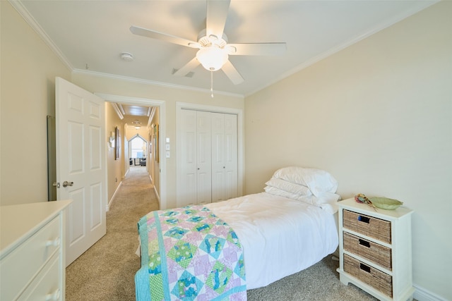 102 Capetown Slip, Conroe, TX 77356 - carpeted bedroom featuring attic access, crown molding, a closet, and ceiling fan