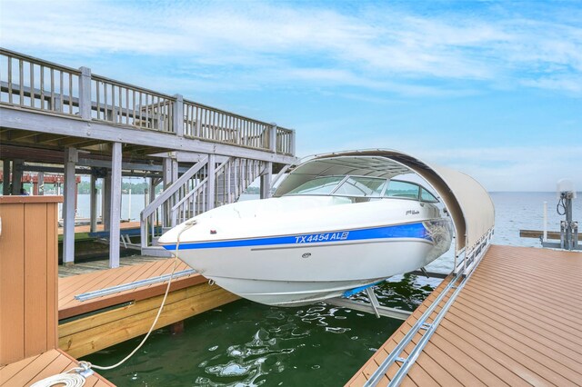 102 Capetown Slip, Conroe, TX 77356 - dock featuring boat lift and a water view