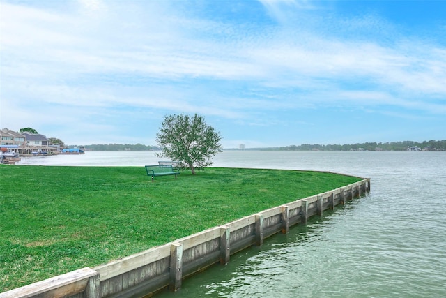102 Capetown Slip, Conroe, TX 77356 - dock area with a water view and a lawn