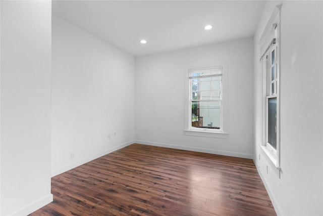 720 W Alabama St, Houston, TX 77006 - empty room featuring dark wood-type flooring and recessed lighting