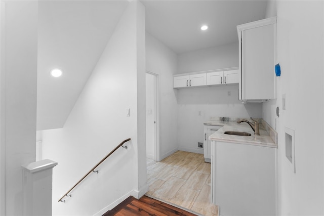 720 W Alabama St, Houston, TX 77006 - washroom with recessed lighting and light wood-style flooring