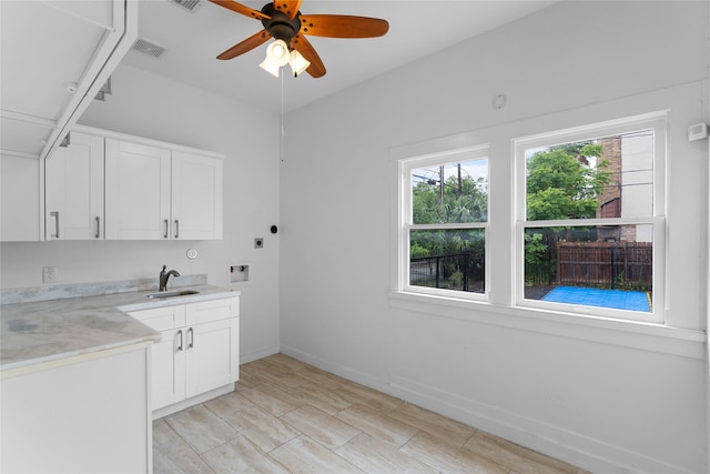720 W Alabama St, Houston, TX 77006 - laundry area featuring cabinet space, washer hookup, hookup for an electric dryer, and a ceiling fan