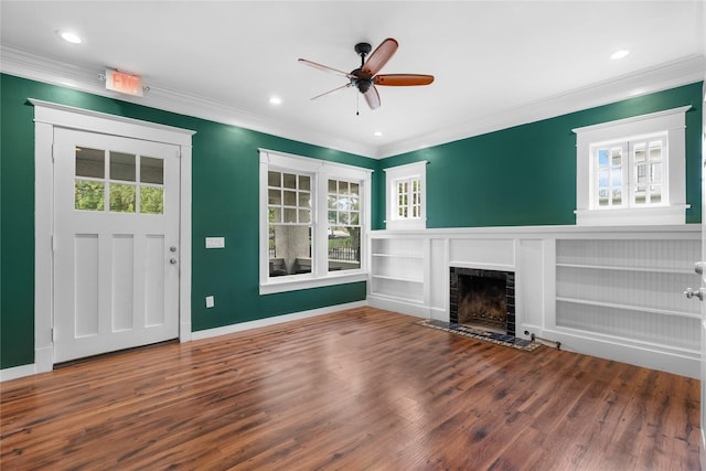 720 W Alabama St, Houston, TX 77006 - unfurnished living room with ceiling fan, wood finished floors, ornamental molding, a tile fireplace, and recessed lighting