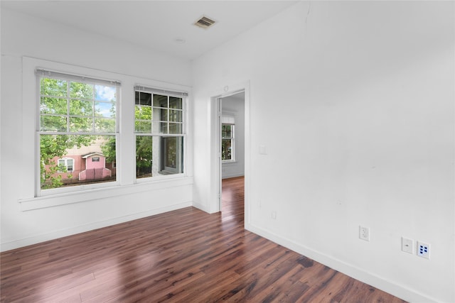 720 W Alabama St, Houston, TX 77006 - spare room with dark wood-style floors and baseboards