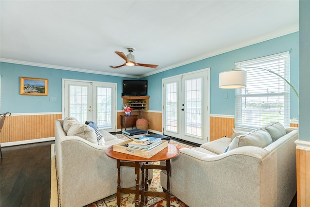 4025 6th St, Galveston, TX 77554 - living room with plenty of natural light, french doors, and a wainscoted wall