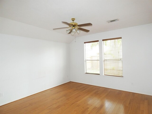 3015 Davey Oaks St, Pearland, TX 77584 - spare room featuring light wood-type flooring, a ceiling fan, and lofted ceiling