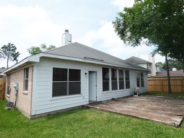 3015 Davey Oaks St, Pearland, TX 77584 - back of property with a deck and a chimney