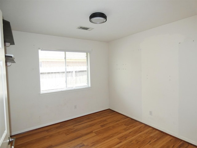3015 Davey Oaks St, Pearland, TX 77584 - unfurnished room featuring wood finished floors