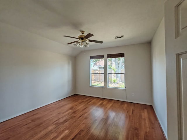 3015 Davey Oaks St, Pearland, TX 77584 - spare room featuring wood finished floors, baseboards, a ceiling fan, and vaulted ceiling