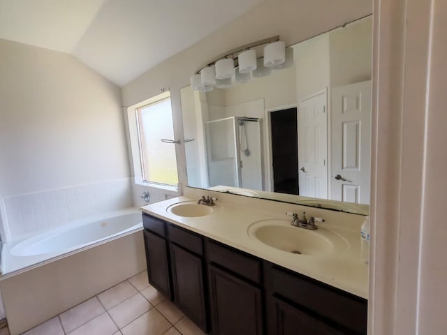 3015 Davey Oaks St, Pearland, TX 77584 - bathroom with a shower stall, a bath, double vanity, lofted ceiling, and tile patterned floors
